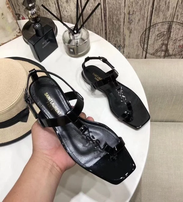 Replica YSL Fake Saint Laurent Cassandra Flat Sandals In Black Patent Leather 3