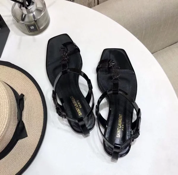 Replica YSL Fake Saint Laurent Cassandra Flat Sandals In Black Patent Leather 7